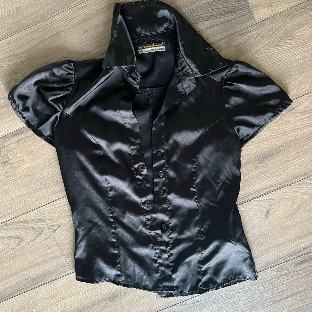 Black tight fitting blouse
